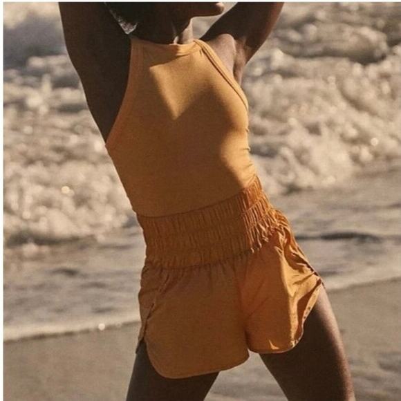 Free People | FP Movement The Way Home Runsie Romper in Marigold Yellow - Picture 2 of 7